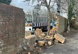 Man in hospital after car crashes into Lidl car park wall