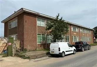 Asbestos-filled science labs on former college campus earmarked for housing again