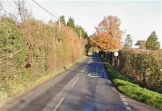 A-road closed following crash and fuel spillage