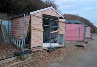 Storm-damaged beach huts to be ready for summer - as two swept into sea