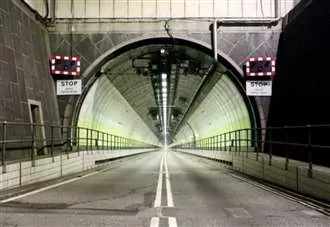 Emergency crews tackle fire in Dartford Tunnel